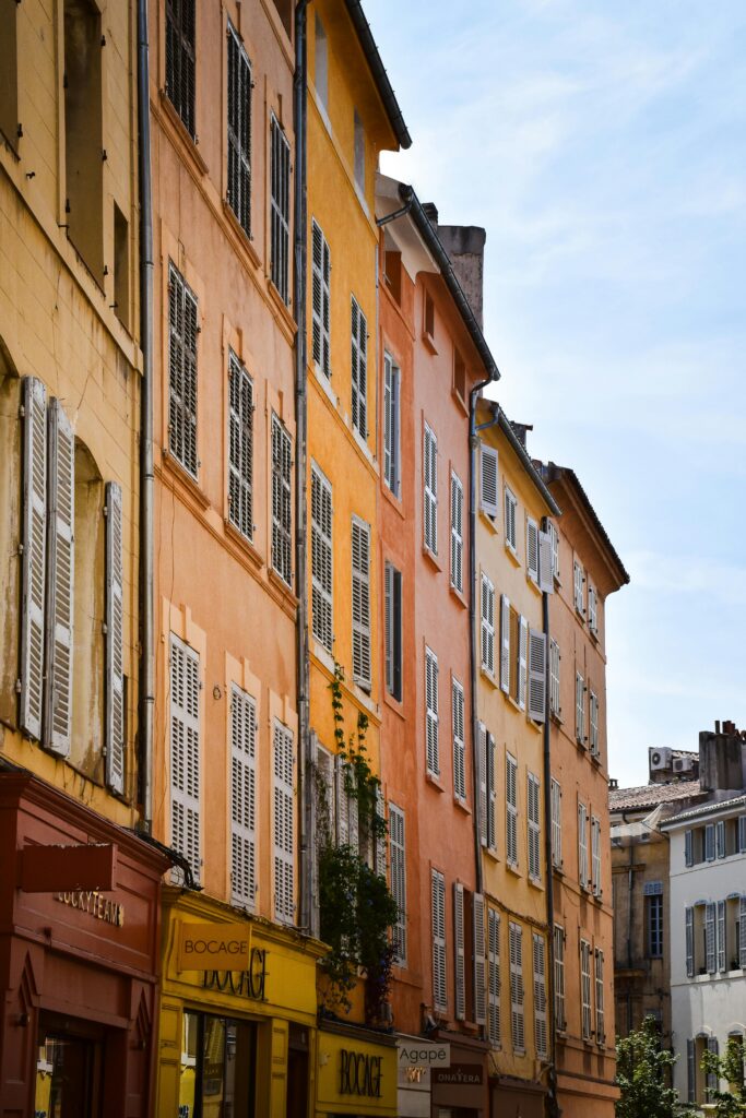 Charming view of colorful historic buildings in Aix-en-Provence, capturing French architecture.