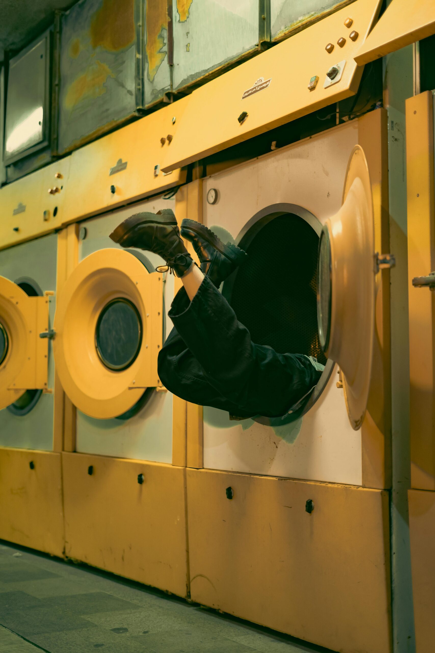 Imaginative shot of an individual inside a washing machine in Tehran, Iran.