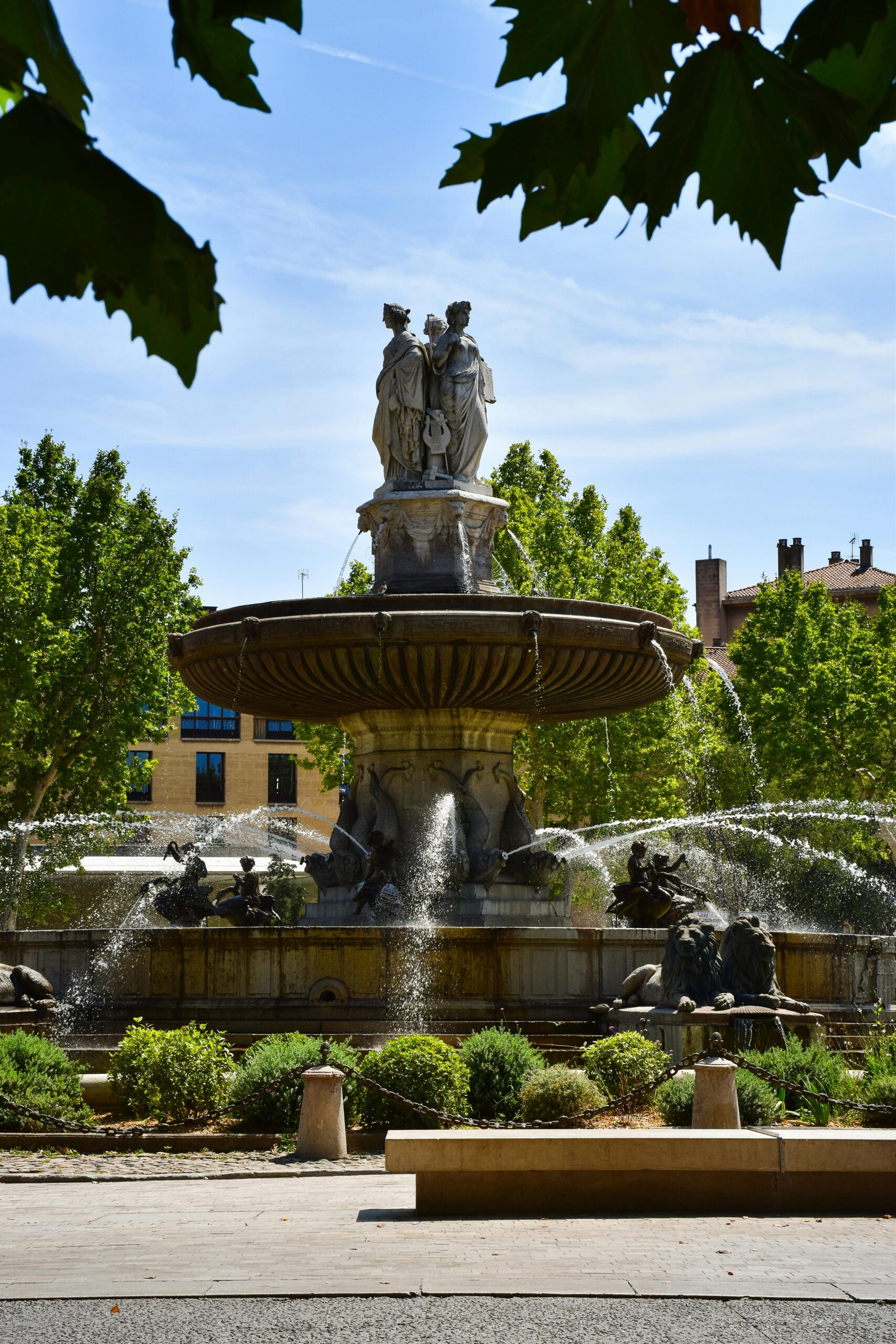 Scenic view of the historic La Rotonde fountain in Aix-en-Provence, capturing its artistic beauty.